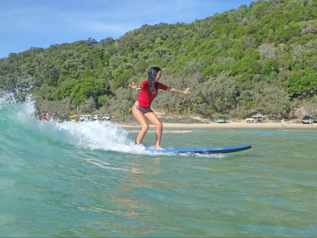 first-surfing-class-lesson-girl-woman-sunshine-coast
