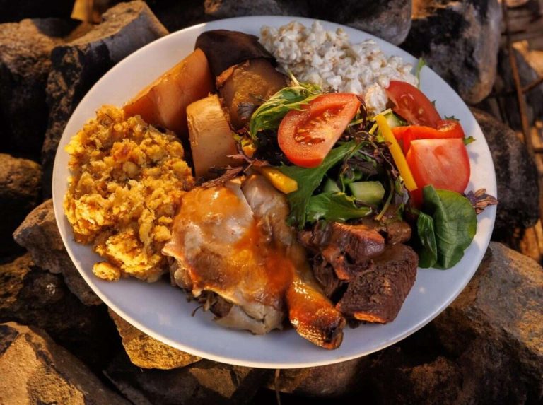 traditional-hāngī-dinner-cooked-in-an-earth-oven-succulent-meats-chicken-kumara